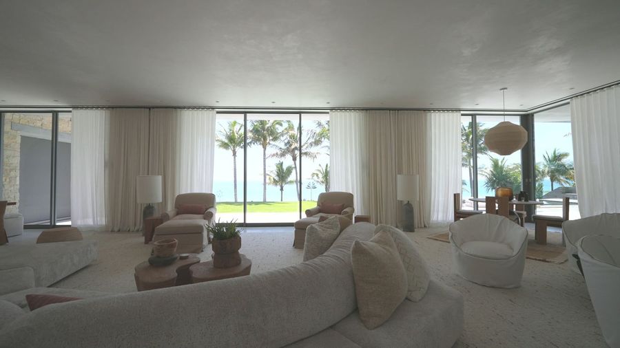 Oceanfront Fort Lauderdale estate dressed in Lutron Palladiom shading and custom draperies