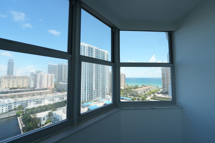 Corner windows with Elba Daylight roller shades raised, Intracoastal view, Hallandale Beach