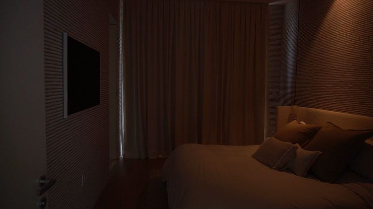 Bedroom with motorized blackout draperies fully closed, Ritz-Carlton Residences Miami Beach