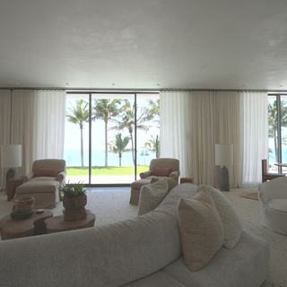 Oceanfront Fort Lauderdale estate dressed in Lutron Palladiom shading and custom draperies