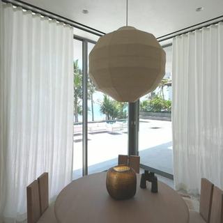 Sheer ripplefold draperies on a customized decorative Lutron track, Fort Lauderdale estate