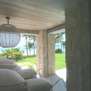 Exterior shades on the ocean-facing terrace of a Fort Lauderdale estate