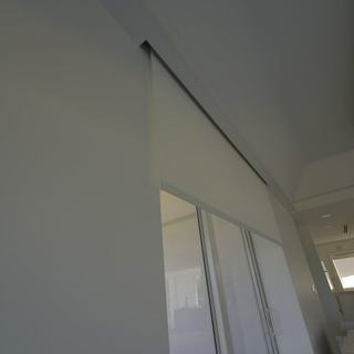 Shade edge detail following the raked gable ceiling line, Hillsboro Beach