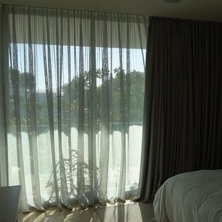 Bedroom with the sheer layer closed and the blackout layer open, Miami Beach