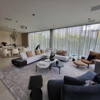 Ripplefold sheers across the living room glass at the Ritz-Carlton Residences Miami Beach
