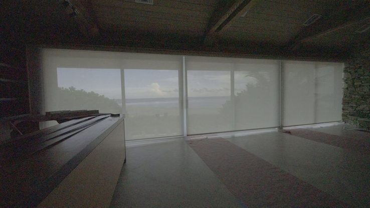 Great room at Bay Drive, Pompano Beach with SheerWeave 4000 Eco 5% Alabaster solar screens fully lowered
