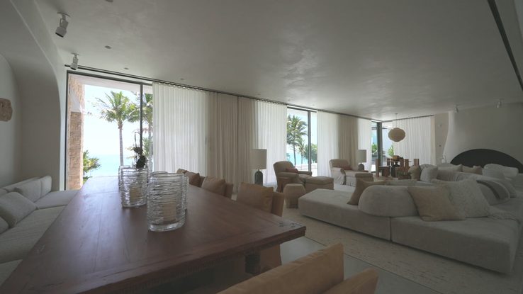 Living room with Palladiom shading and imported sheer fabrics