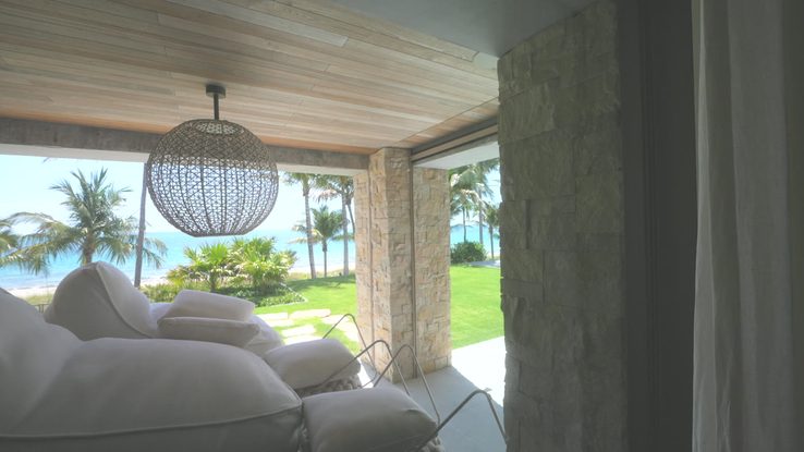 Exterior shades on the ocean-facing terrace of the Fort Lauderdale estate
