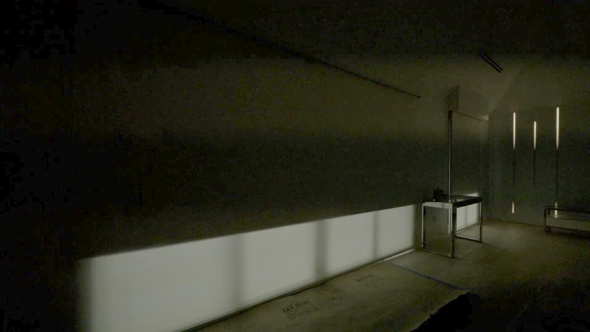 The same primary bedroom with the blackout layer of the dual shade lowered, room dark, Hillsboro Beach